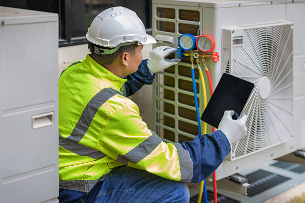 Professional Air Conditioning Repair technician working in Sand Lake, NY